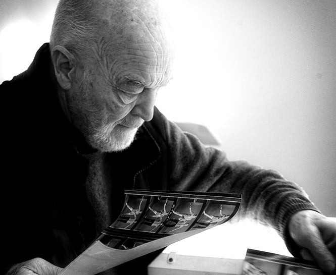 Brian Duffy sorting through his contact sheets